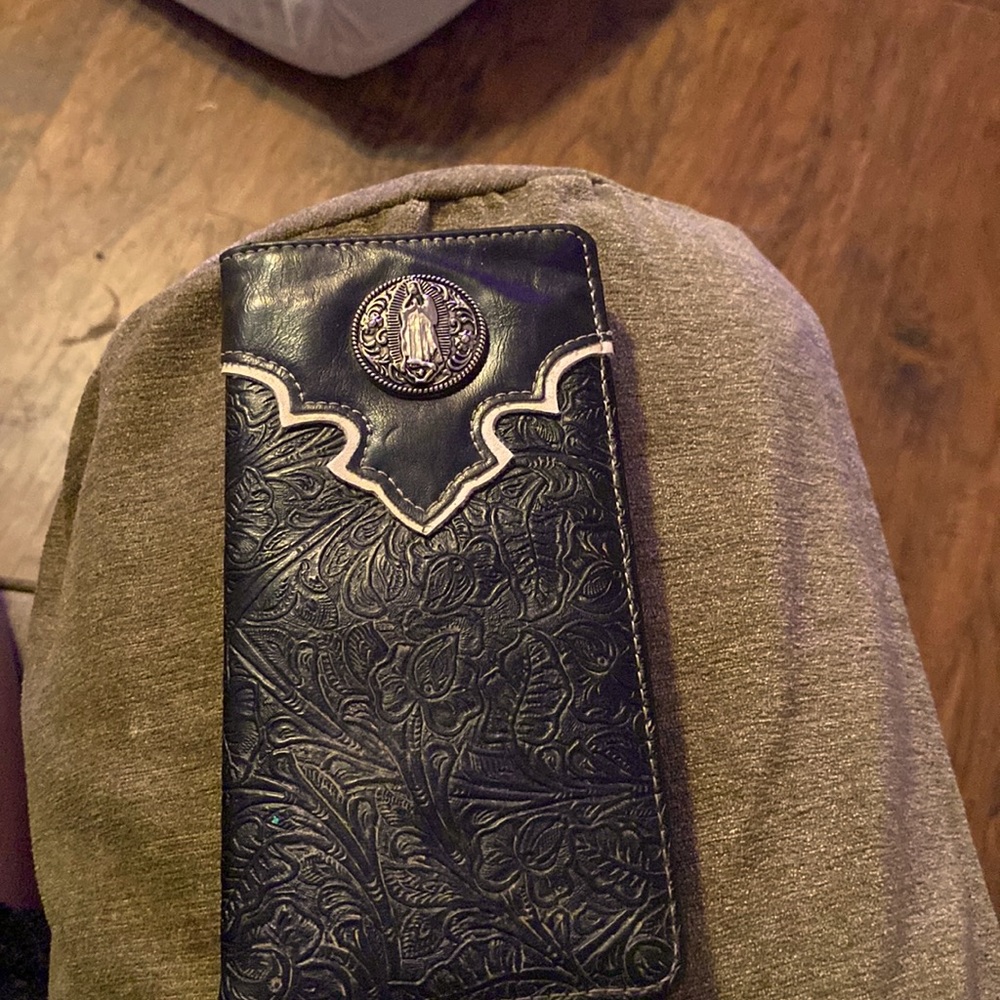 Catholic theme wallet very sexy if I do say so.  Swagger boost.  I’m looking.